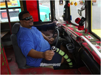 A friendly Samoan bus driver on the 'Sunset Express'