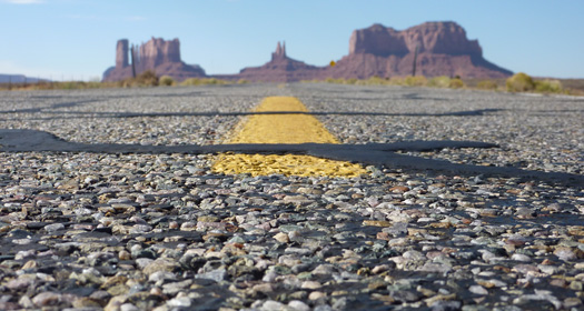 Riding along Route 163 into Monument Valley